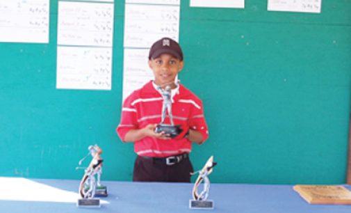 Younger golfer wins his division