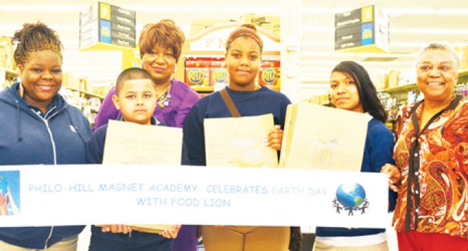 Students spread Earth Day messages with paper bag art