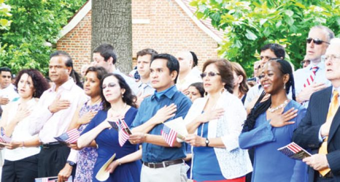 New citizens take oath on patriotic holiday