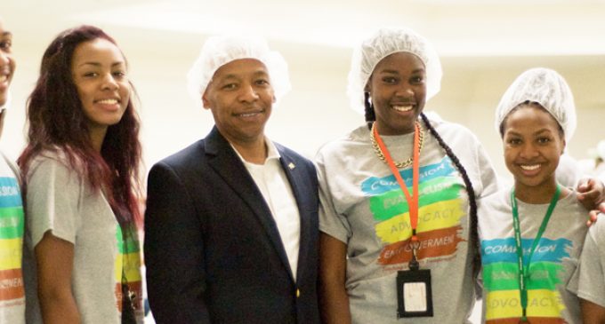 WSSU chancellor,  600 youth package meals for needy