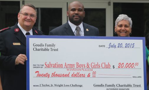 Councilman James Taylor presents check to Boys and Girls Club