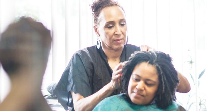 A new twist: Natural hair in the work place is  becoming more popular
