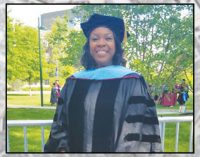 Triad publisher receives doctorate