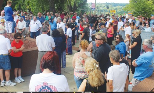 More than 100 people  gather to pray for law enforcement