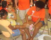 Thousands of children receive new shoes