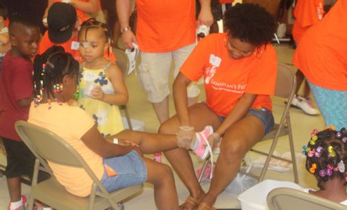 Thousands of children receive new shoes