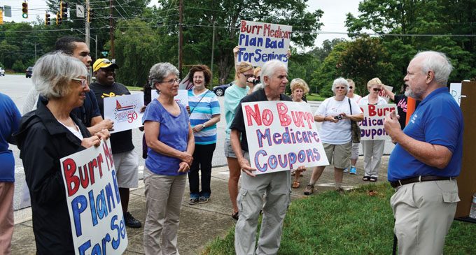 Protest focuses on Burr’s Medicare history