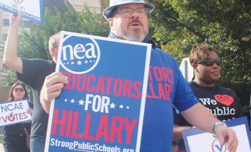 Educators march to polls in early voting