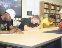 Three Eagles sign to play college basketball