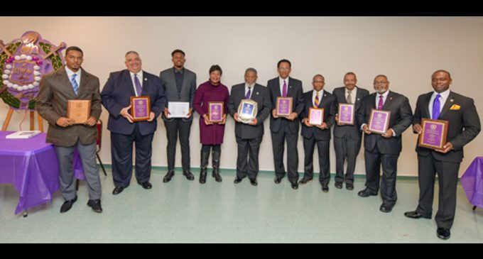 Omega Psi Phi chapter honors local citizens, awards scholarship