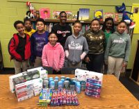 Young Democrats make donations to students at Kimberley Park