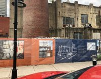 Local artist adds pizzazz to construction fences