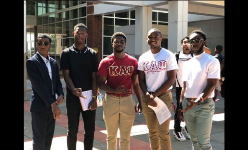 Members of Kappa Alpha Psi register students to vote at WSSU