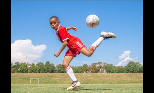 Young athlete focuses in on the game of soccer