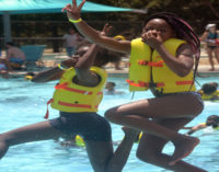 Marva Reid treats local children to a day at the water park