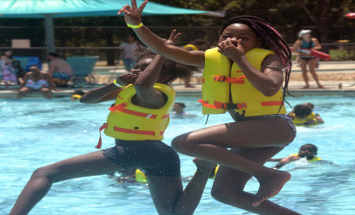 Marva Reid treats local children to a day at the water park