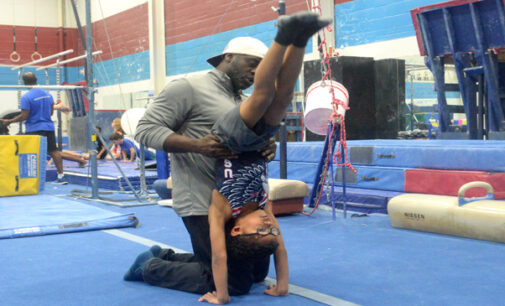 Team USA qualifier coaches son to  state gymnastics title