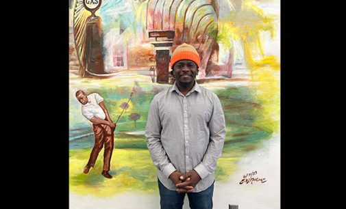 Artist Ernel Martinez highlights Carver High School in a mural depicting history of Winston-Salem
