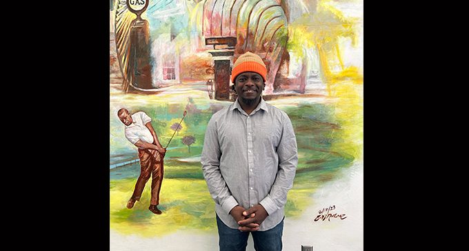 Artist Ernel Martinez highlights Carver High School in a mural depicting history of Winston-Salem