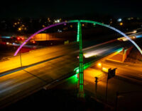 Twin Arches light up the sky in pink and green to mark the 100th anniversary of AKA Phi Omega chapter