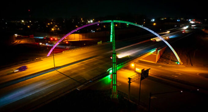 Twin Arches light up the sky in pink and green to mark the 100th anniversary of AKA Phi Omega chapter