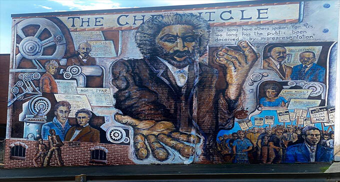 ‘The Chronicle,’ the first downtown mural honoring the history of the Black press, still draws visitors for photo ops