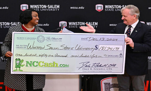 Winston-Salem State Chancellor Bonita Brown calls check from NCCash.com ‘Holiday Cheer’