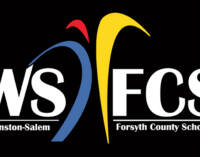 School district moving forward with plan to cut positions